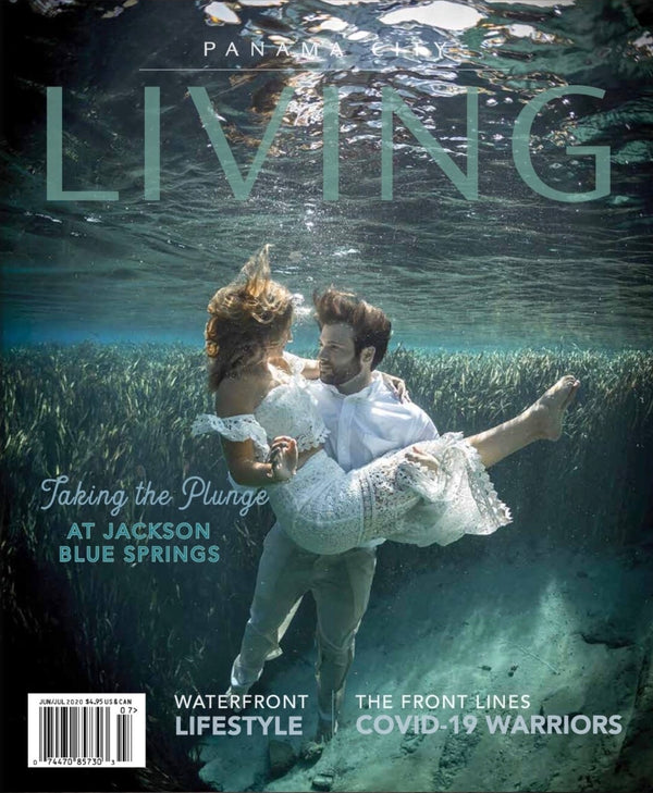 Underwater wedding by photographer John Starrett makes the cover of Living Magazine