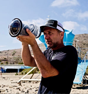 Cinematographer Mathew Sutherland using Outex waterproof camera housing with Lumix GH5 II during surf shoot for The California Double short film