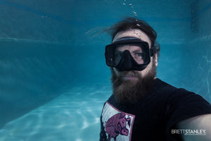 Underwater photographer Brett Stanley shooting a portrait session using an Outex waterproof camera housing system