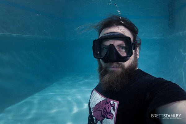 Underwater photographer Brett Stanley shooting a portrait session using an Outex waterproof camera housing system
