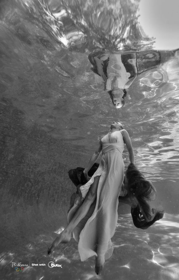 Underwater portrait shot using an Outex waterproof camera housing — illustrating professional underwater photography techniques