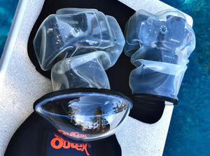 Split-level underwater photo taken with Outex optical glass dome port showing above and below water
