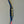 Fused electrical cable with red and blue wires on a gray background