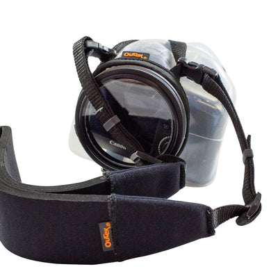 Camera with an Outex case and a neck strap attached to it