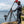 Man Setting up a Tripod Add-on Kit