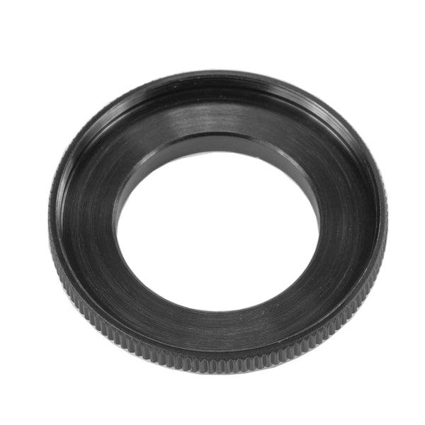 A black step up ring on a white background